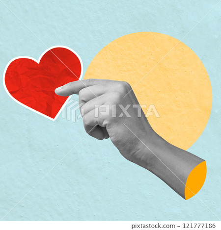 A human hand holding a red heart on a colored background A human hand holding a red heart on a colored background 121777186