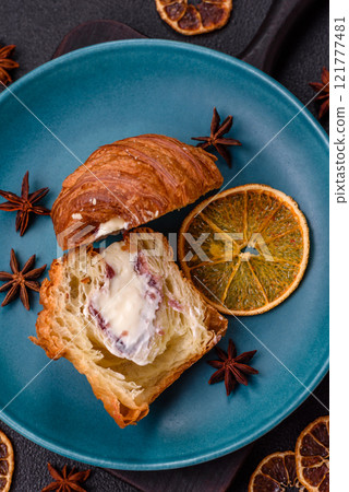 Sweet craffin made from puff pastry with Swiss meringue 121777481