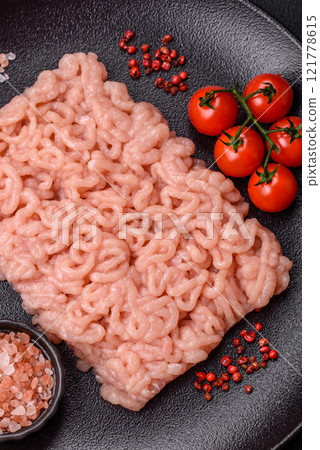 Fresh raw chicken mince with salt, spices and herbs 121778615