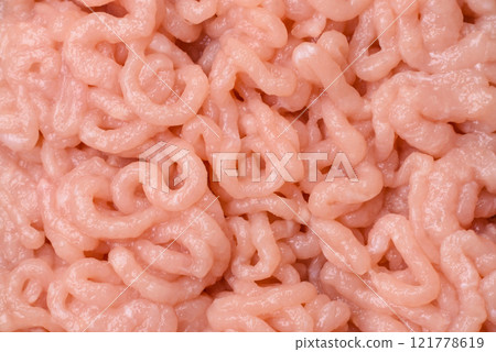 Fresh raw chicken mince with salt, spices and herbs Fresh raw chicken mince with salt, spices and herbs 121778619