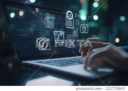 在筆記型電腦和數位圖示上工作的手部全息圖 121778841