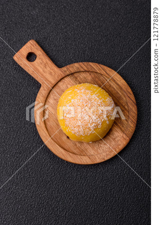 Delicious colorful asian mochi sweets with rice dough shell and fruit filling 121778879