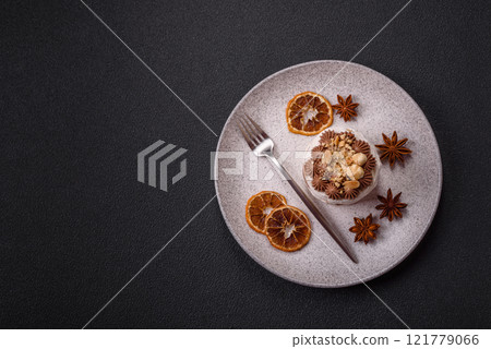 Sweet puff tart with meringue, cream and nuts 121779066