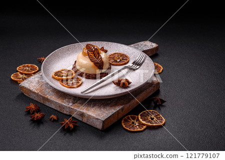 Sweet tart with pear lemon mousse cream and chocolate cake base Sweet tart with pear lemon mousse cream and chocolate cake base 121779107