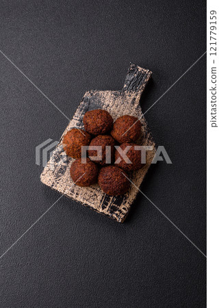 Falafel vegetarian and vegan dish made with chickpeas, spices and herbs 121779159