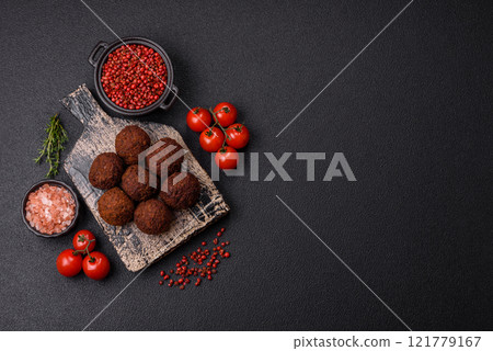 Falafel vegetarian and vegan dish made with chickpeas, spices and herbs 121779167