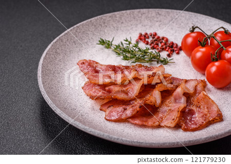 Delicious crispy bacon grilled with salt and spices 121779230