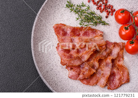 Delicious crispy bacon grilled with salt and spices Delicious crispy bacon grilled with salt and spices 121779231