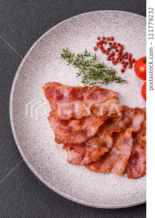 Delicious crispy bacon grilled with salt and spices 121779232