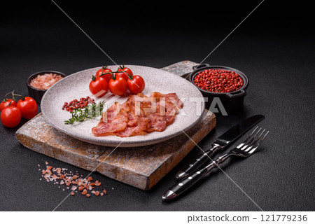 Delicious crispy bacon grilled with salt and spices 121779236