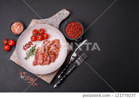 Delicious crispy bacon grilled with salt and spices 121779237