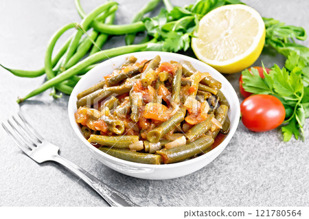 Beans green with vegetables in bowl on stone 121780564