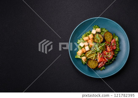 Hearty delicious fried falafel made from chickpeas, cumin, hummus with salt and spices Hearty delicious fried falafel made from chickpeas, cumin, hummus with salt and spices 121782395