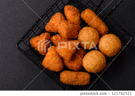 Brie cheese or camembert fries in breading, fast food, takeaway Brie cheese or camembert fries in breading, fast food, takeaway 121782521