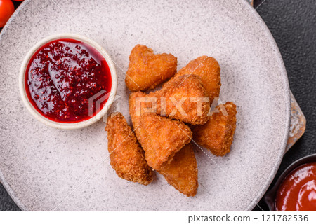 Brie cheese or camembert fries in breading, fast food, takeaway Brie cheese or camembert fries in breading, fast food, takeaway 121782536