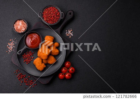 Delicious fresh crispy chicken nuggets, unhealthy food, fast food Delicious fresh crispy chicken nuggets, unhealthy food, fast food 121782666