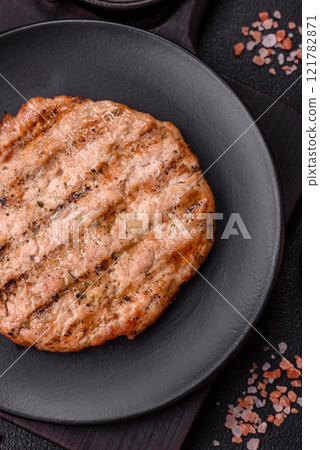Juicy grilled beef or pork steak with salt, spices and herbs Juicy grilled beef or pork steak with salt, spices and herbs 121782871