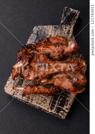 Ribs or rack of beef baked on the grill with salt, spices and herbs Ribs or rack of beef baked on the grill with salt, spices and herbs 121783051
