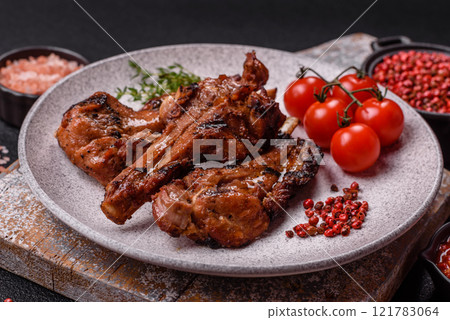 Ribs or rack of beef baked on the grill with salt, spices and herbs 121783064