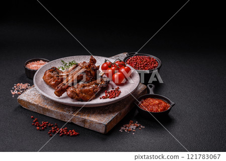 Ribs or rack of beef baked on the grill with salt, spices and herbs 121783067