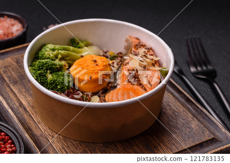 Grilled salmon with salt and spices, broccoli, tomatoes, rice Grilled salmon with salt and spices, broccoli, tomatoes, rice 121783135