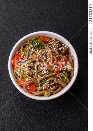 Buckwheat noodles with vegetables, salt and spices 121783219