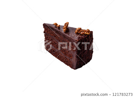 Piece of sweet chocolate cake with nuts Piece of sweet chocolate cake with nuts 121783273
