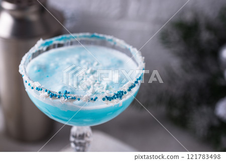 Christmas cocktail with blue curacao Christmas cocktail with blue curacao 121783498