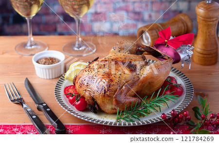 Eating roast chicken at Christmas 121784269