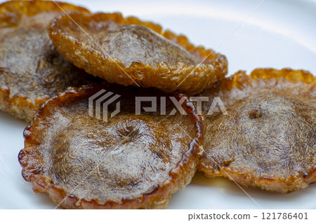 Close up of traditional sweetness of Panjaram. Asian food concept. Close up of traditional sweetness of Panjaram. Asian food concept. 121786401