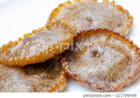 Close up of traditional sweetness of Asian food of Panjaram. Close up of traditional sweetness of Asian food of Panjaram. 121786406