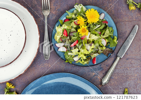 Fresh dandelion salad 121787623