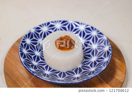 Steamed radish topped with egg yolk miso Steamed radish topped with egg yolk miso 121788612