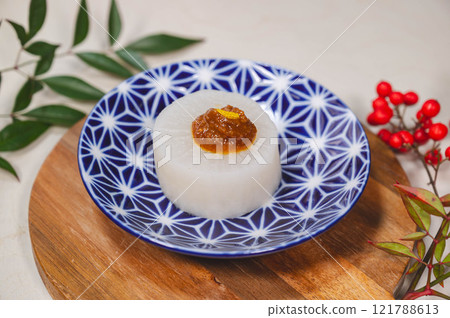 Steamed radish topped with egg yolk miso 121788613