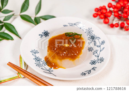Bath-fried daikon radish topped with miso sauce Bath-fried daikon radish topped with miso sauce 121788616