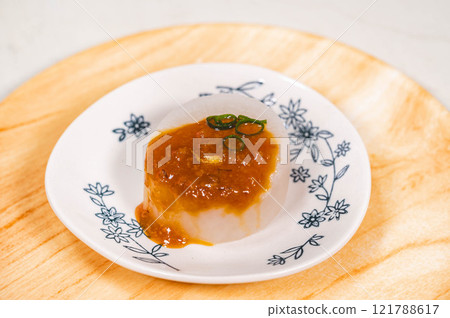 Bath-fried daikon radish topped with miso sauce 121788617