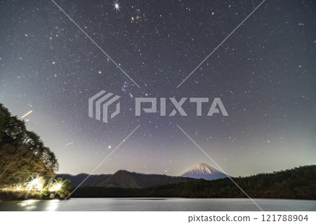 Winter starry sky over Lake Sai Winter starry sky over Lake Sai 121788904