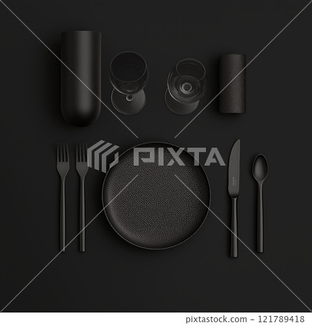 Black table setting with plate, two forks, knife, napkin, and coaster on dark background 121789418