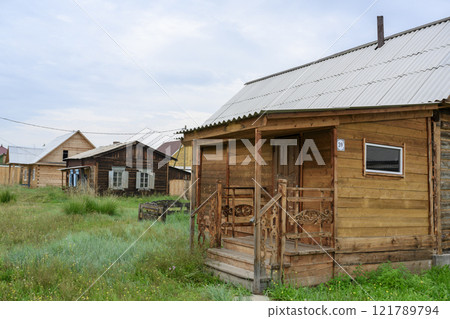 Wooden houses next to the Buddhist monastery in Ivolginsky Datsan in Buryatia, Russia Wooden houses next to the Buddhist monastery in Ivolginsky Datsan in Buryatia, Russia 121789794