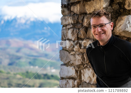 45 yo man at the castle of Berat, Albania 121789892