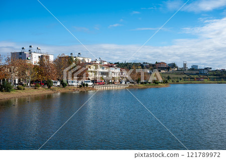 Recreation zone at the touristical Belshi Lake, Albania 121789972