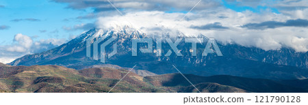 Snow topped mountains and green hills around Berat, Albania Snow topped mountains and green hills around Berat, Albania 121790128