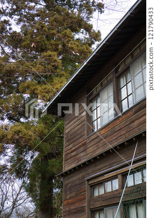 A wooden school building that has been preserved after being closed down 121790433