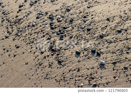 Structure of a gravel on the sand, Sicily, Italy 121790805