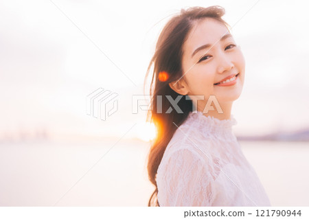 Beauty image with sunset background Beauty image with sunset background 121790944