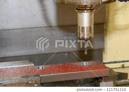 The CNC milling machine rough cutting the mold parts by flat end mill tools. The CNC milling machine rough cutting the mold parts by flat end mill tools. 121791310
