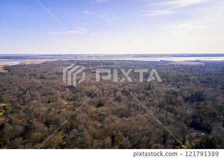Panoramic view of the Eastcost of Kattegat, Jutland, close to Mariager fjord, Denmark. Natural landscape with sparse vegetation and the horizon in the view. Seasons changing from winter to spring 121791389