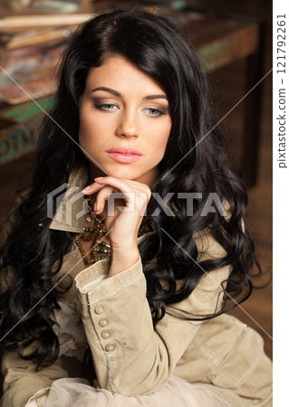 Nice young adult woman with long wavy hair and make-up fashion portrait Nice young adult woman with long wavy hair and make-up fashion portrait 121792261