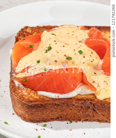 Brioche breakfast toast with egg and salmon Brioche breakfast toast with egg and salmon 121792268