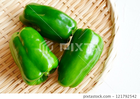 Fresh bell peppers on a colander 121792542